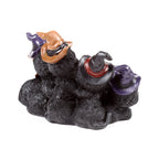 Tres gatos con sombrero LED