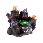Tres gatos con sombrero LED