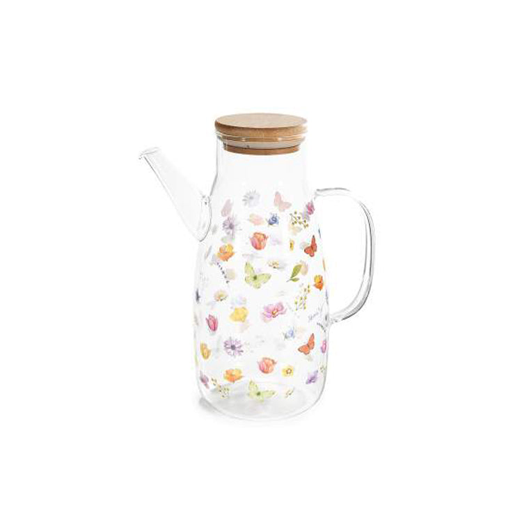 Jarra vidrio con flores